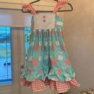Easter dress by Eleanor Rose for your precious girl! Has pink and white rabbits!